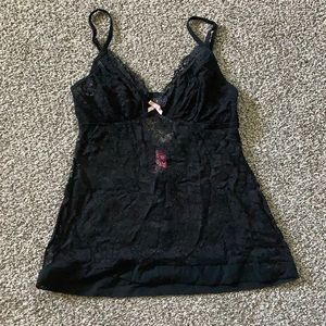 Black sheer lace cami, has open back detail